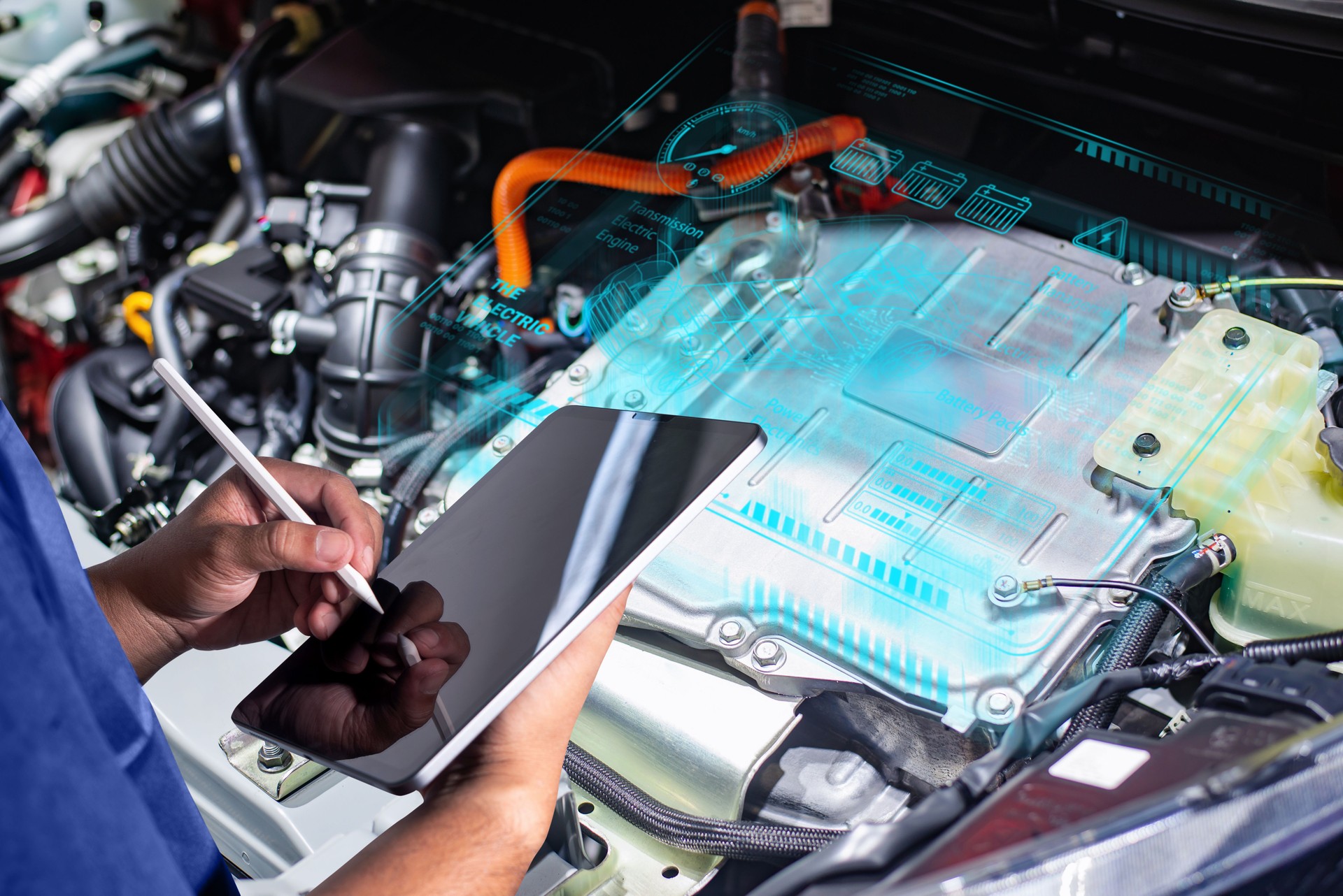 Technician Diagnosing Electric Vehicle with Tablet